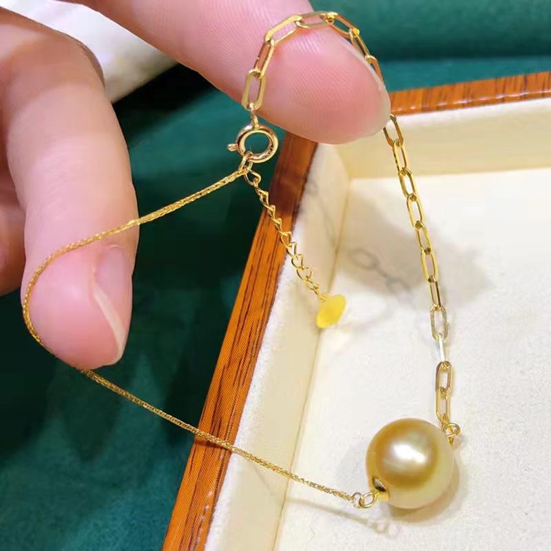 Number C 18KGold sea water pearls necklace ring earring bracelet (priced as a deposit)