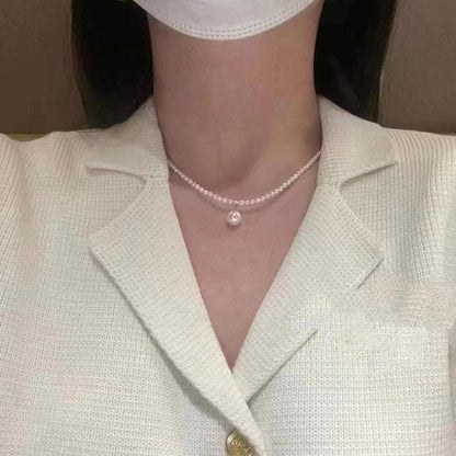 Number P necklace (priced as a deposit) Daily